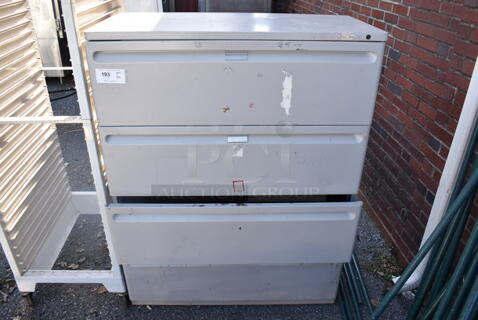 Gray 4 Drawer Filing Cabinet. 41.5x20x54