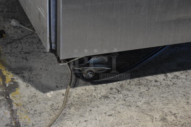 2011 True TG2R-2S ENERGY STAR Stainless Steel Commercial 2 Door Reach In Cooler w/ Poly Coated Racks on Commercial Casters. 115 Volts, 1 Phase. Tested and Working! - Image 4 of 7