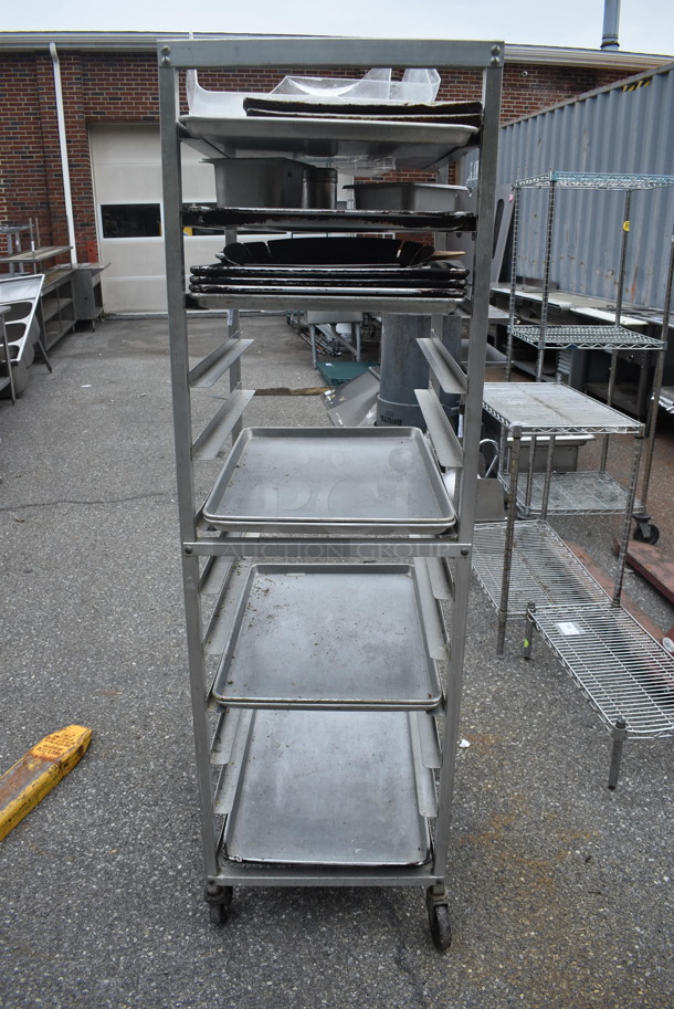 Commercial Stainless Steel Utility Cart With Steel Trays, Muffin Tins, Etc On Commercial Casters.