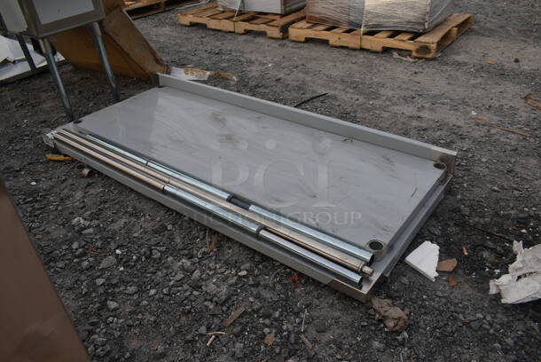 BRAND NEW SCRATCH AND DENT! Regency 600TSB3072S Stainless Steel Commercial Tabletop w/ Back Splash and Under Shelf. - Image 2 of 4