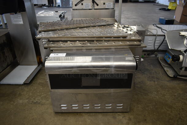 Ovention C20003PH Stainless Steel Commercial Electric Powered Conveyor Pizza Oven. Missing Conveyor Belt. 208/240 Volts, 3 Phase.
 - Image 1 of 7