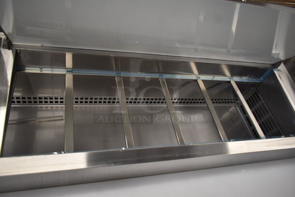 BRAND NEW SCRATCH AND DENT! 2023 Avantco 178SSPPT3 Stainless Steel Commercial Refrigerated Pizza Prep Table on Commercial Casters. 115 Volts, 1 Phase. Tested and Working! - Image 8 of 12