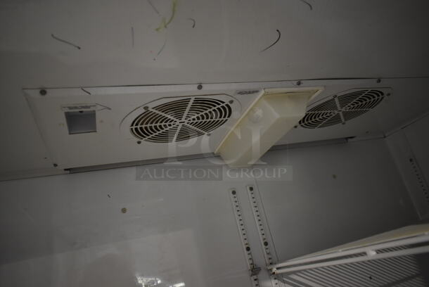 2012 True TG2R-2S ENERGY STAR Stainless Steel Commercial 2 Door Reach In Cooler w/ Poly Coated Racks on Commercial Casters. 115 Volts, 1 Phase. Tested and Working! - Image 8 of 9