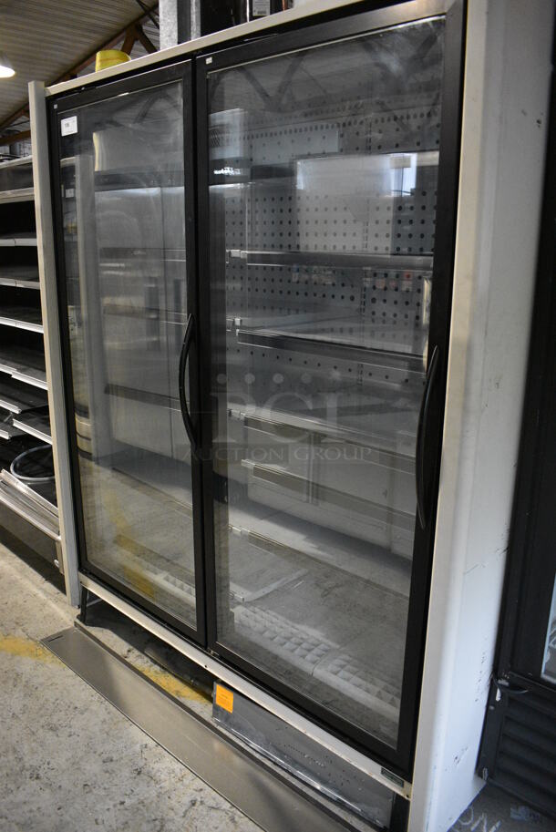 Zero Zone Model 2RHZC30 Metal Commercial 2 Door Reach In Cooler Merchandiser w/ Racks. 115/208-230 Volts, 1 Phase. 66x38x80