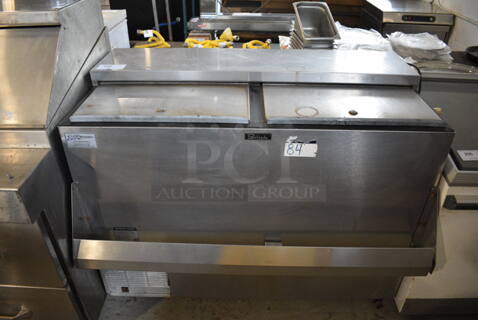 Perlick Model FR48SS Stainless Steel Commercial Bottled Back Bar Cooler w/ 2 Sliding Lids and Speedwell on Commercial Casters. 115 Volts, 1 Phase. 48x28x38. Tested and Working!