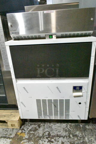 BRAND NEW! 2015 Manitowoc RF0385A Stainless Steel Commercial Self Contained Ice Machine. 115 Volts, 1 Phase. 