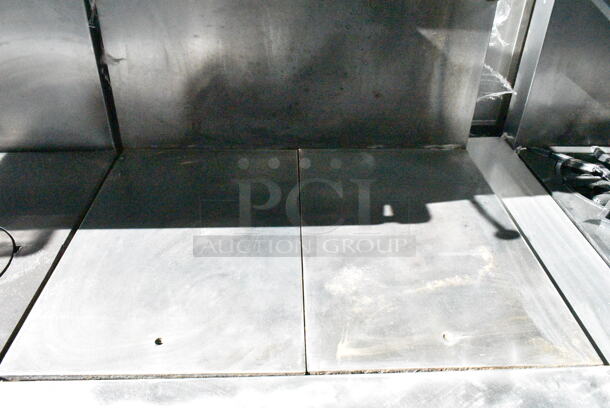 Garland M45R Stainless Steel Commercial Natural Gas Powered Flat Top w/ Oven, Over Shelf and Back Splash on Commercial Casters.  - Image 3 of 8