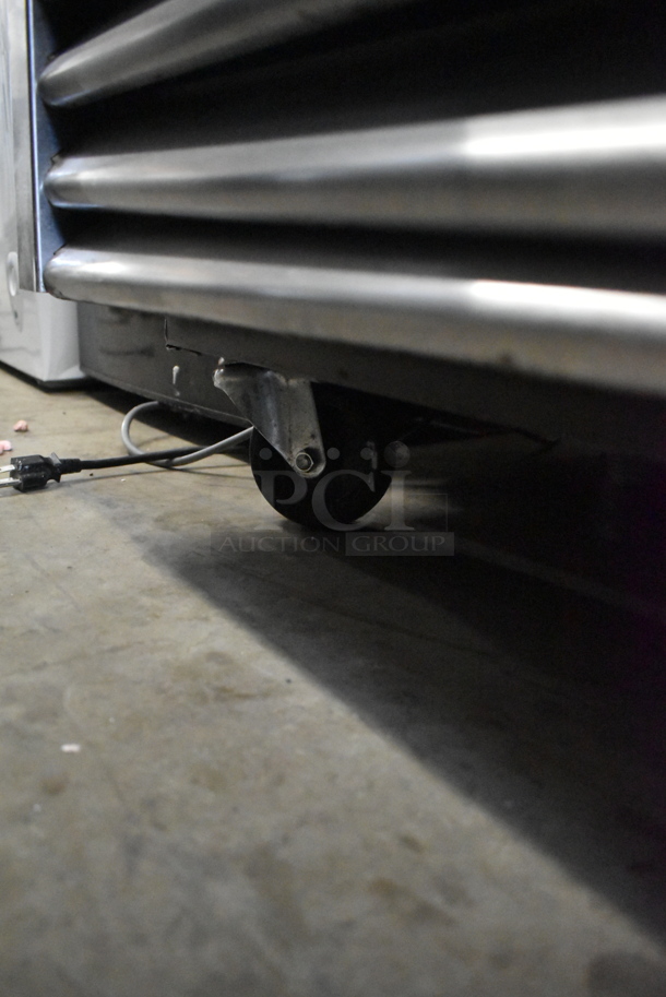 2016 True T-35 Stainless Steel Commercial 2 Door Reach In Cooler w/ Poly Coated Racks on Commercial Casters. 115 Volts, 1 Phase. Tested and Powers On But Does Not Get Cold - Image 2 of 7
