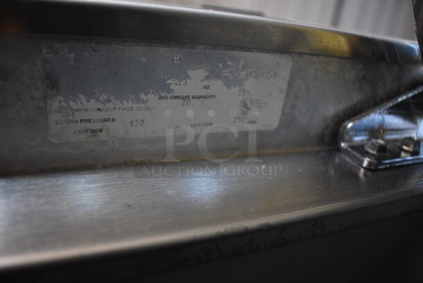 Delfield Stainless Steel Commercial 3 Door Reach In Cooler w/ Poly Coated Racks on Commercial Casters. 77x32x80. Cannot Test Due To Plug Style - Image 4 of 6