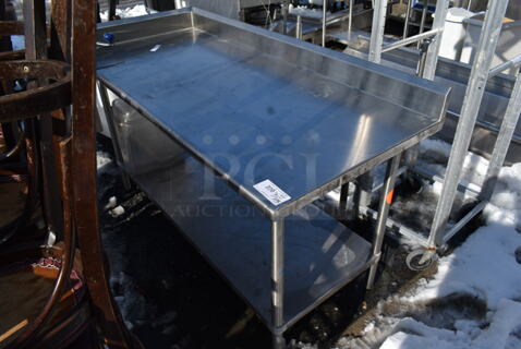 Stainless Steel Commercial Table w/ Back Splash and Under Shelf.