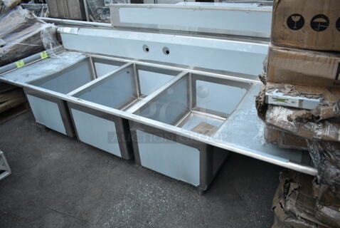 BRAND NEW SCRATCH AND DENT! Regency 600S32030220 Stainless Steel Commercial 3 Bay Sink w/ Dual Drain Boards. Bays 20x30. Drain Boards 18.5x32. 