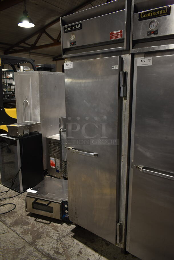 2016 Continental 1F Stainless Steel Commercial Single Door Reach In Freezer on Commercial Casters. 115 Volts, 1 Phase. Tested and Powers On But Does Not Get Cold