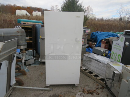 One White Westinghouse 1 Door Stand Up Freezer With 4 Shelves. 115 Volt. Model# MFU21N3BW4. 32X29X70