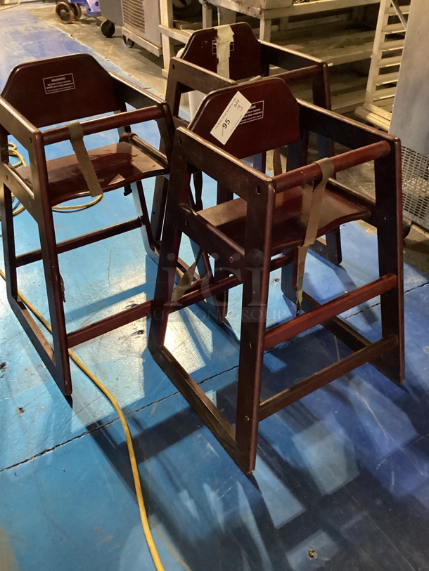 3 - Dark Wooden High Chairs 
Your Bid x 3 
 - Image 2 of 3