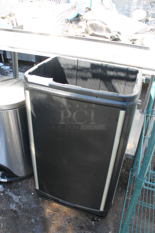 Black Poly Portable Ice Bin on Commercial Casters.