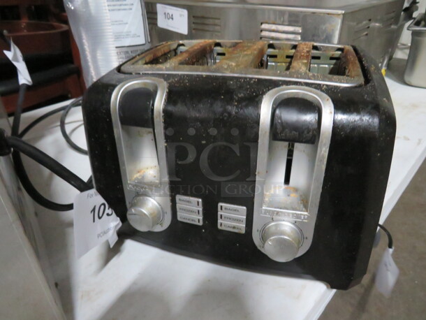 One Black And Decker 4 Slice Toaster. #T4569B