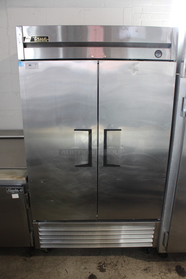 2012 True Model T-43 Stainless Steel Commercial 2 Door Reach In Cooler w/ Poly Coated Racks on Commercial Casters. 115 Volts, 1 Phase. 47x30x83.5. Tested and Working!