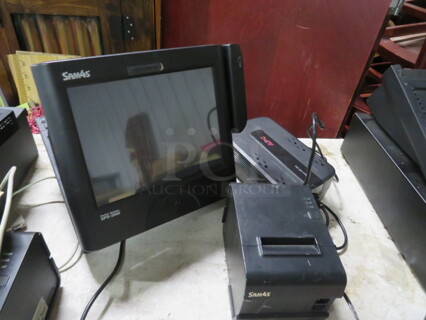 One SAM4S POS System, Including, 1 #SPS-2000 Terminal, SAM4S Thermal Printer #ELLIX-20 II VS, 1 APC Battery Backup UPS-350. 