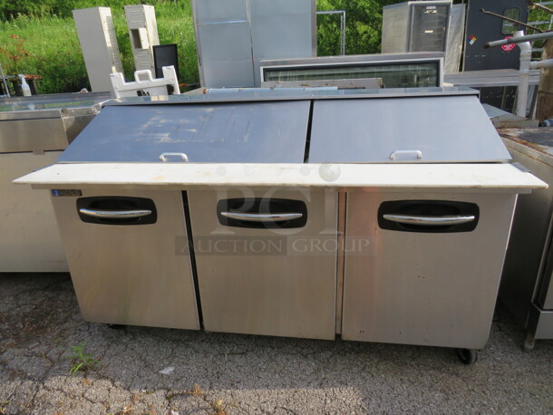 One WORKING Stainless Steel 3 Door Refrigerated Masterbilt Prep Table With 3 Racks On Casters. Model3 SMP72-30A. 115 Volt. 72X33X44. - Image 1 of 3