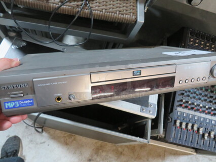 One Samsung DVD/CD/MP3 Player. DVD-M301.