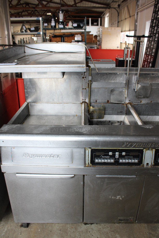 Frymaster Model FMP345EBLCSD Stainless Steel Commercial Floor Style Natural Gas Powered 3 Bay Deep Fat Fryer w/ Left Side Dumping Warming Station and Filtration System on Commercial Casters. 122,000 BTU. 68x35x55 - Image 3 of 11