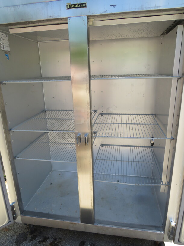 One Traulsen 2 Door Freezer With 6 Racks On Casters. WORKING WHEN REMOVED. 115 Volt. Model# G22010. 52.5X32X83.5 - Image 3 of 3