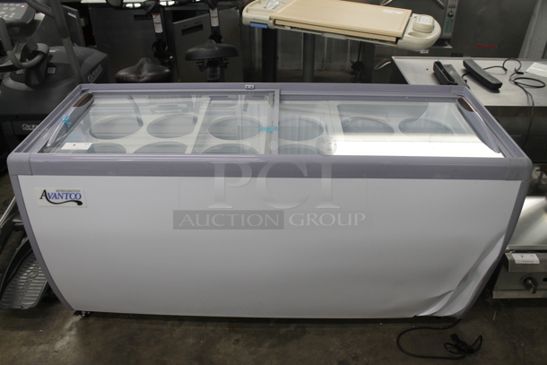 BRAND NEW SCRATCH AND DENT! Avantco ADC-12C-HC Curved Glass Ice Cream Dipping Cabinet - 71" on Commercial Casters 115 Volt, 1 Phase. Tested and Working! - Image 1 of 10