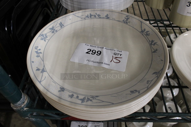15 Ceramic Plates w/ Blue and White Floral Pattern on Rim. 10.5x10.5x1. 15 Times Your Bid!