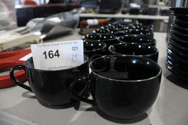 12 Black Ceramic Mugs. 4x3.5x2.5. 12 Times Your Bid! - Image 1 of 3