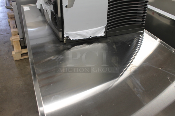 BRAND NEW SCRATCH AND DENT! Avantco 178CBE72HC Commercial Stainless Steel Electric 4-Door Refrigerated Chef Base On Commercial Casters.  115 Volts, 1 Phase. Tested and Working! - Image 3 of 11
