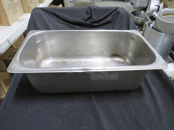 One 1/3 Size 4 Inch Deep Stainless Hotel Pan.