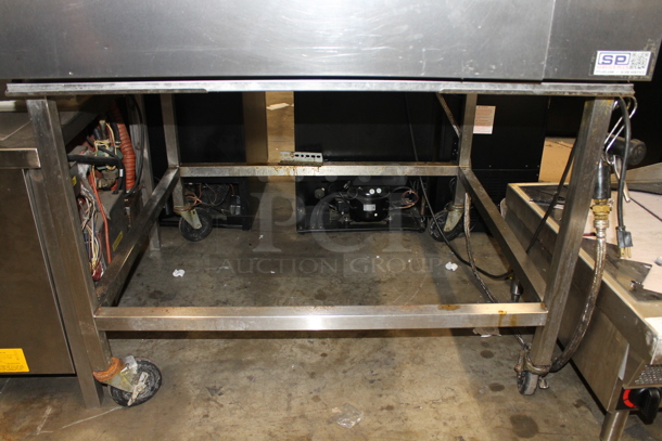 Vulcan ABC7G-NAT Stainless Steel Commercial Natural Gas Powered Combi Convection Oven on Commercial Casters.
 - Image 7 of 8