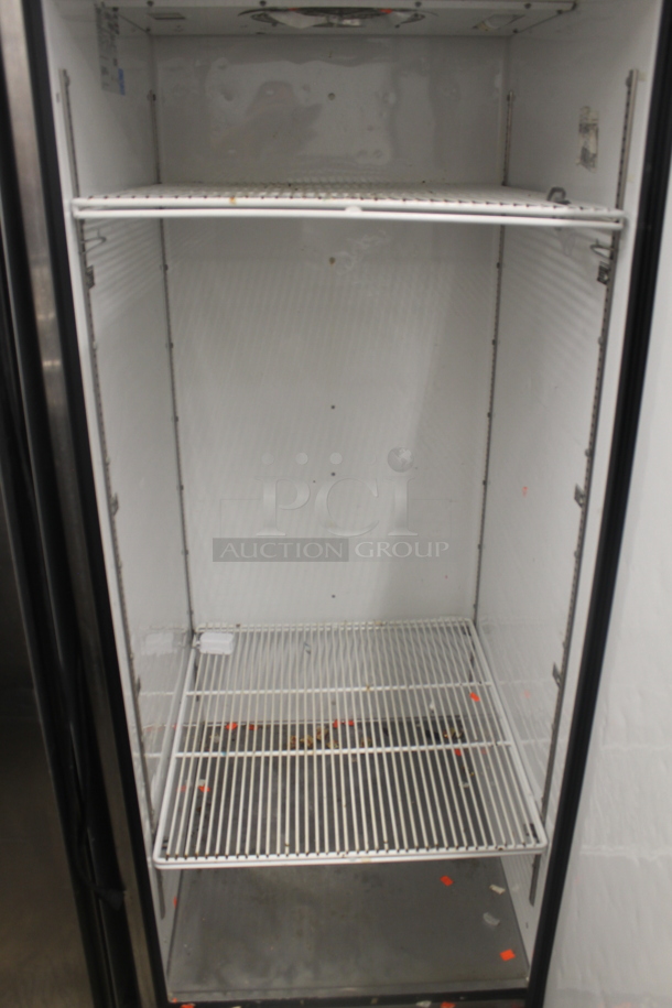 2014 True TG1R-1S ENERGY STAR Stainless Steel Commercial Single Door Reach In Cooler w/ Poly Coated Racks on Commercial Casters. 115 Volts, 1 Phase. Tested and Working! - Image 5 of 6