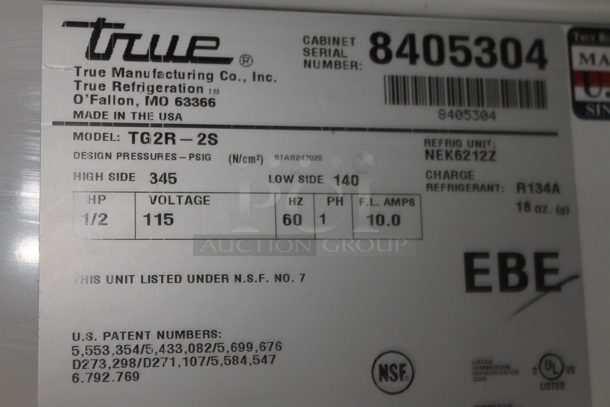 2014 True TG2R-2S ENERGY STAR Stainless Steel Commercial Two Door Reach In Cooler w/ Poly Coated Racks on Commercial Casters. 115 Volts, 1 Phase. Tested and Working! - Image 7 of 7