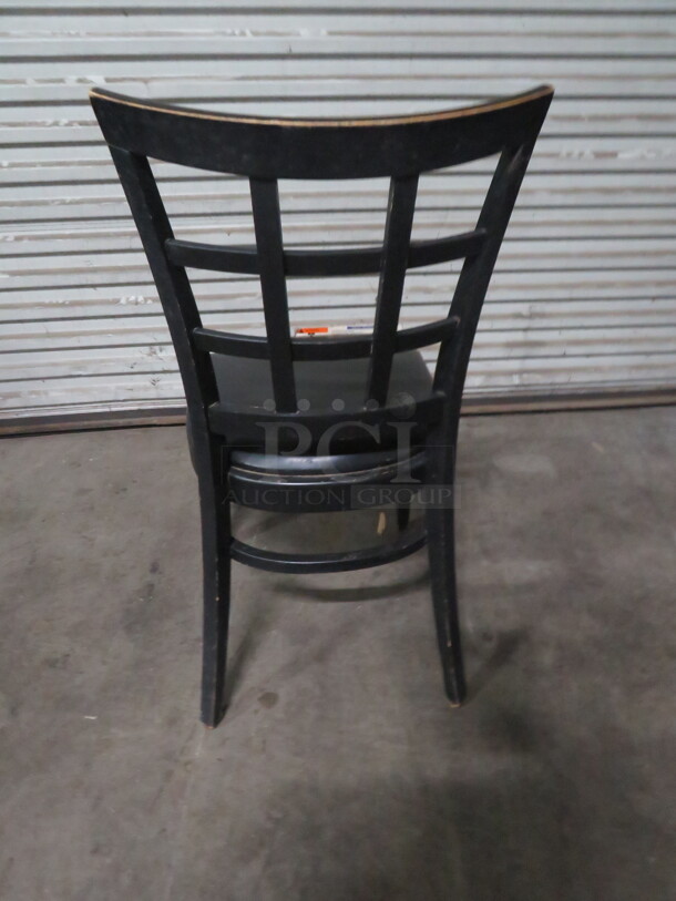 Black Wooden Chair With A Black Cushioned Seat. 4XBID - Image 2 of 2