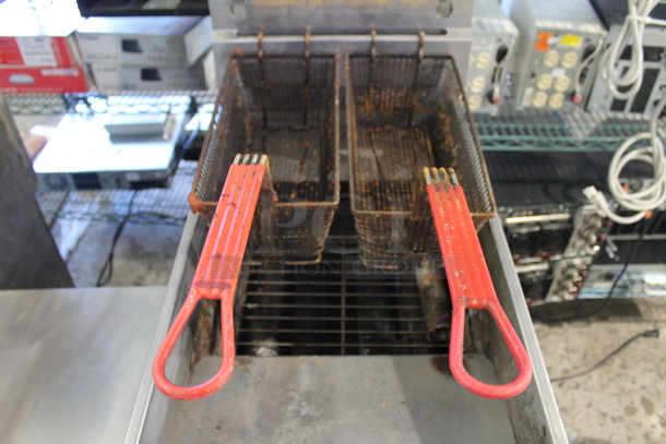 2015 Pitco Frialator SG14 Stainless Steel Commercial Floor Style Natural Gas Powered Deep Fat Fryer w/ 2 Metal Fry Baskets on Commercial Casters. 110,000 BTU. - Image 2 of 4