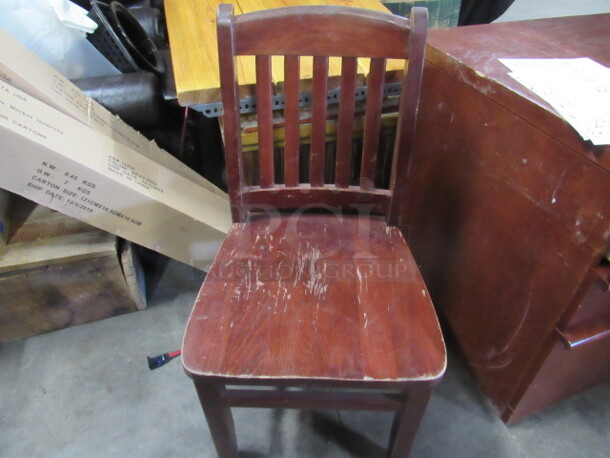 One Wooden Schoolhouse Chair.