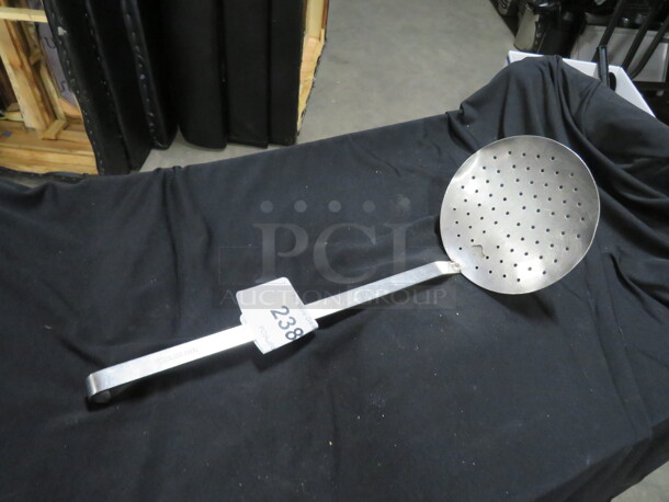 One Stainless Steel Perforated Scoop.