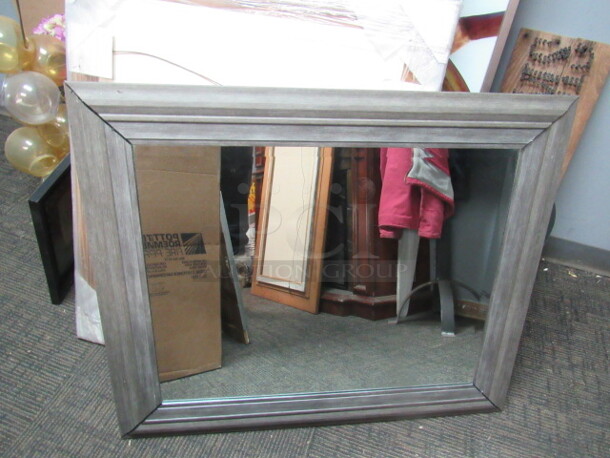 One 30X36 Framed Mirror.