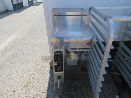 One Fetco Coffee Brewer With Filter Basket. #CBS-2051E. 120/208-240 Volt. 1 Phase.  13X17X38