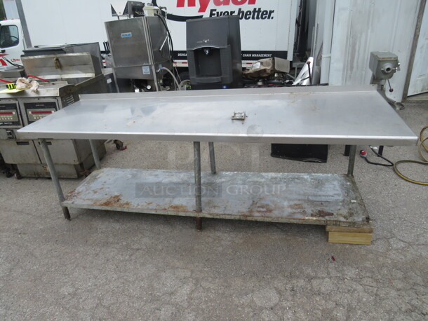 One Stainless Steel Table With Under Shelf, With Nemco Bracket Attached. Missing 1 Leg.  96X29X35 - Image 1 of 1
