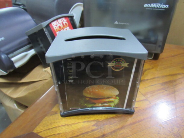 One Complete 360 Table Top Napkin Dispenser.