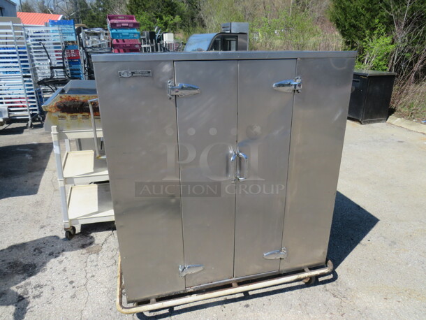 One Stainless Steel 2 Door Holding Cabinet With 3 Racks On Casters. 51X29X55