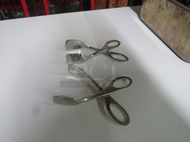 Stainless Steel 7 Inch Tong. 2XBID
