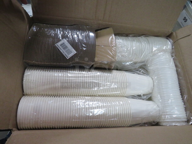 One Lot Of Coffee Cups, Lids And Sleeves. - Image 1 of 1