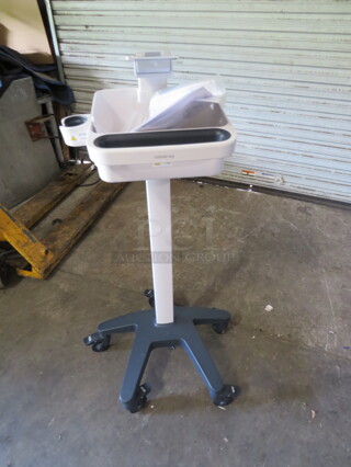 One NEW Rolling Medi Cart. 