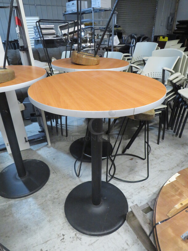 One Brown Laminate Table Top On A Bar Height Pedestal Base. 30X42