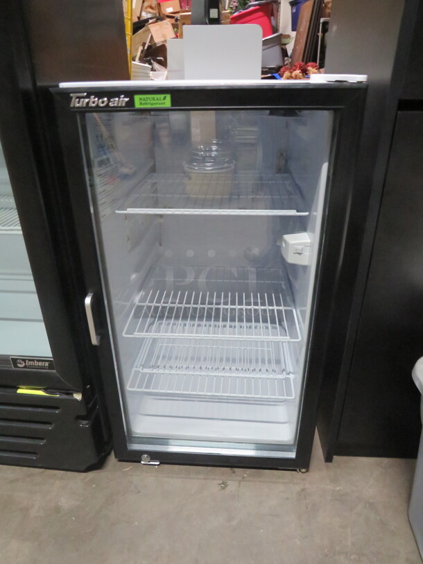 One WORKING Turbo Air Countertop Glass Door Refrigerator With 3 Racks. Model# TGM-5R-N6. 110-120 Volt. 19X21X34 - Image 1 of 2