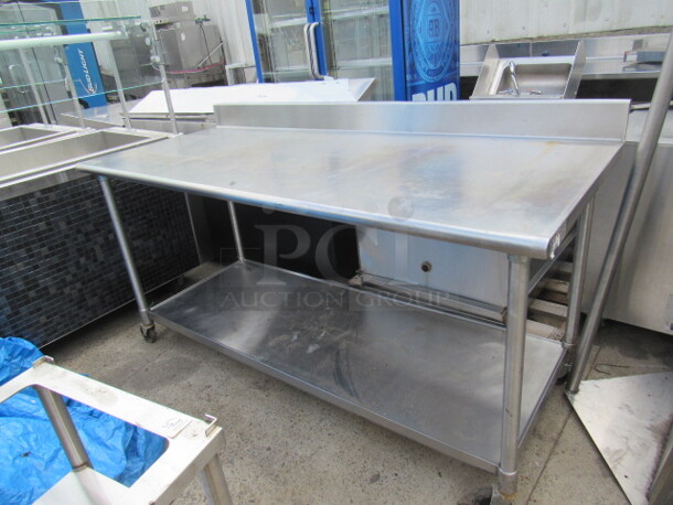 One Stainless Steel Table With A Stainless Steel Under Shelf On Casters. 72X30X40