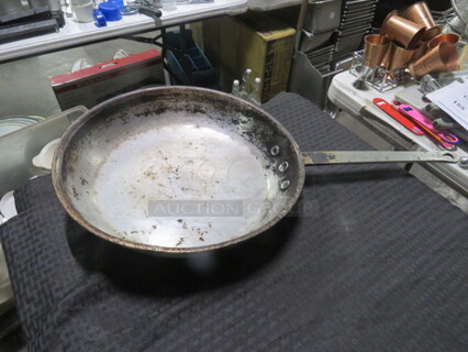 One 14.5 Inch Superior Fry Pan. 